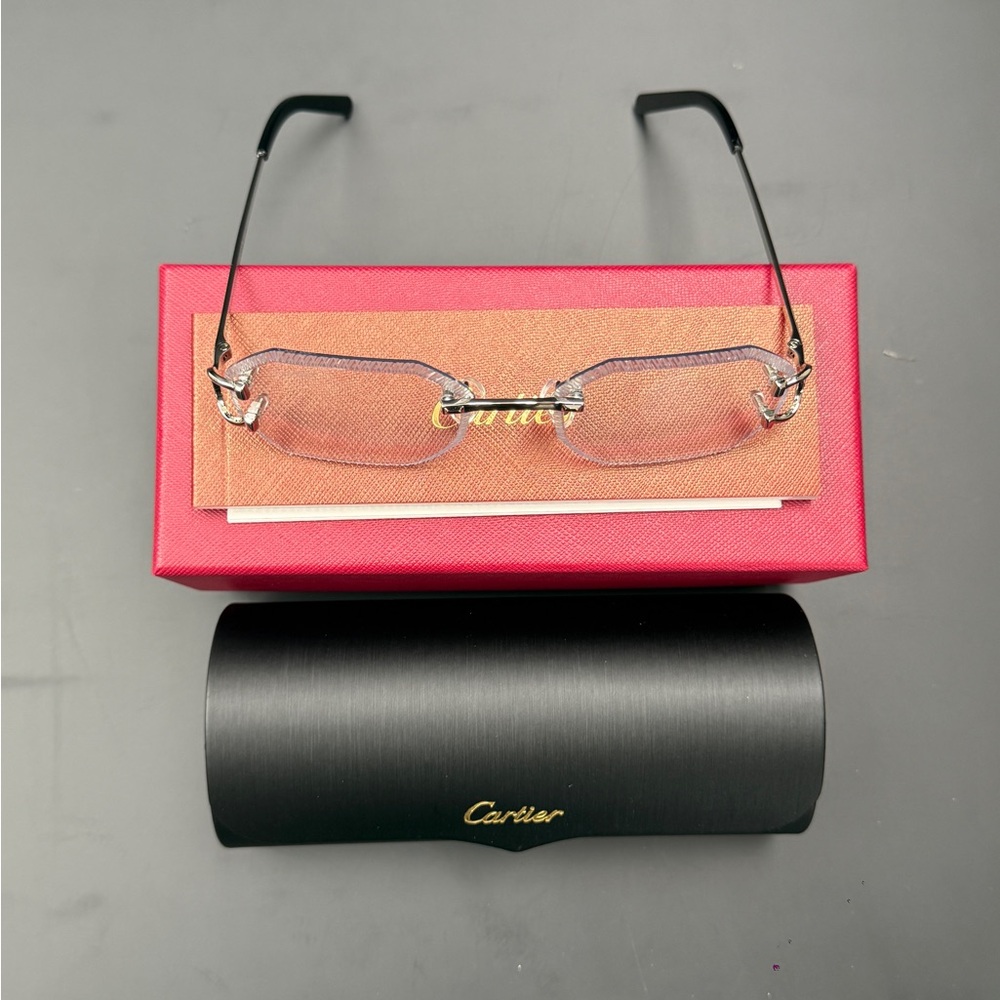 Cartier Rimless Glasses with Pink Lenses and Black Temples